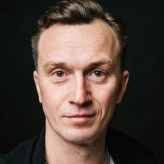 Денис Старков