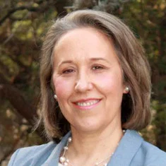 Dr. Christine Mann