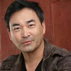 Larry Tazuma