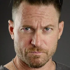 Adam T Perkins
