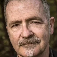 Adrian Hughes