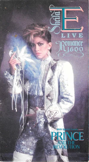 Постер: Sheila E.: Live Romance 1600