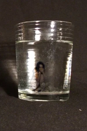 Постер: Drowning In a Glass of Water